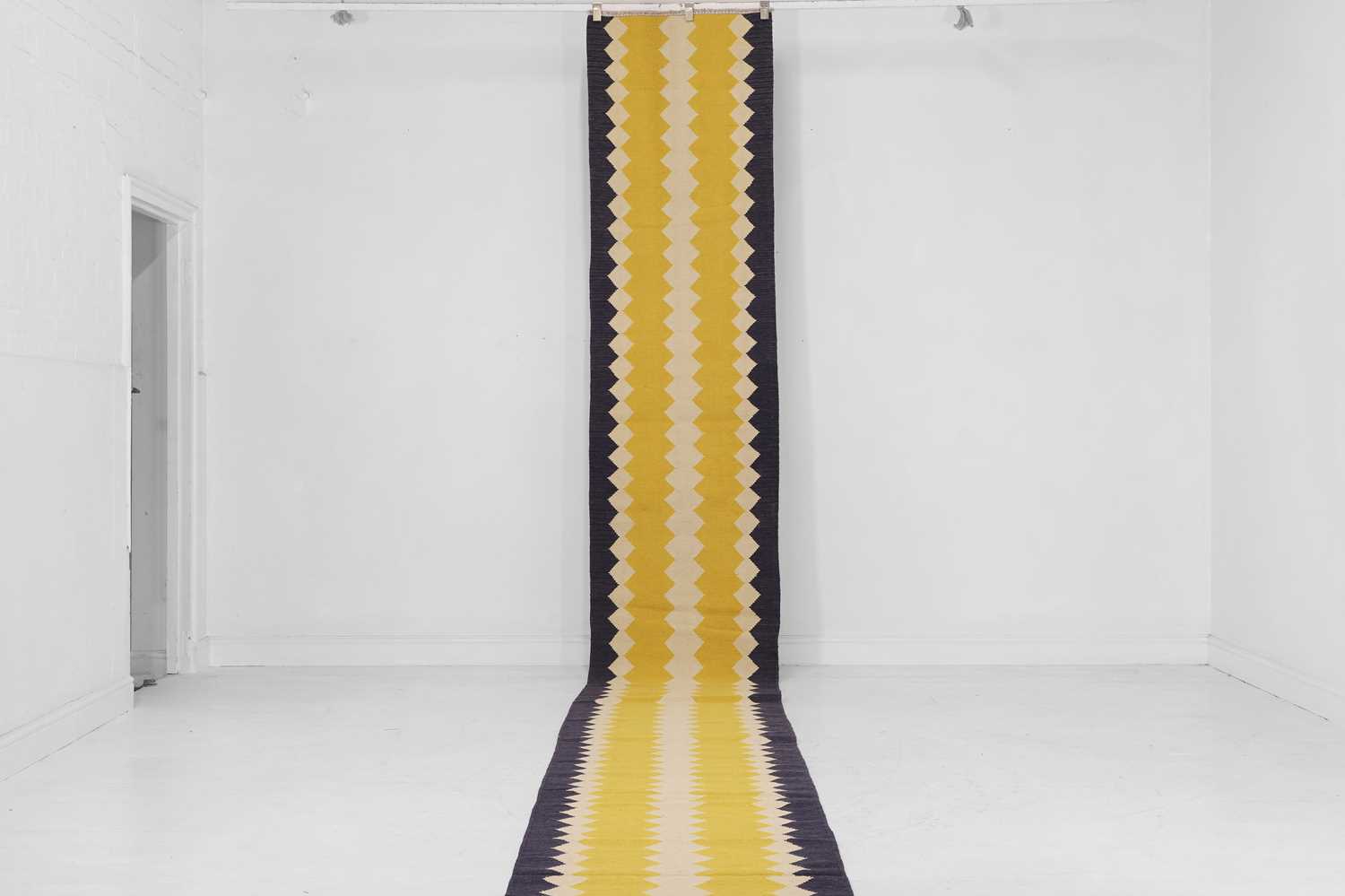 Lot 281 - A long flat-weave wool stair runner