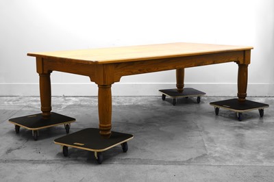 Lot 507 - A large beechwood and pine kitchen table