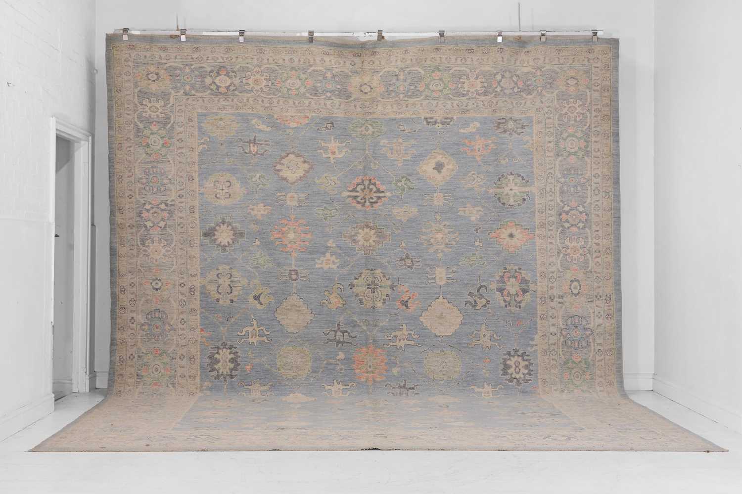 Lot 36 - An Oushak wool carpet