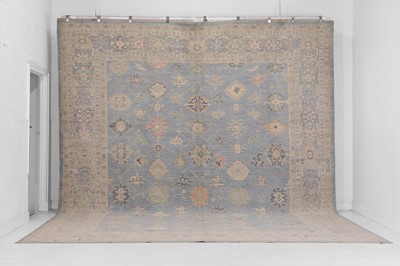 Lot 36 - An Oushak wool carpet