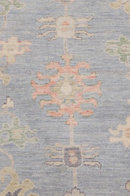 Lot 36 - An Oushak wool carpet