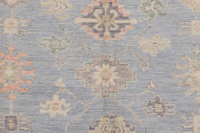 Lot 36 - An Oushak wool carpet