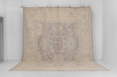 Lot 43 - An Oushak wool carpet