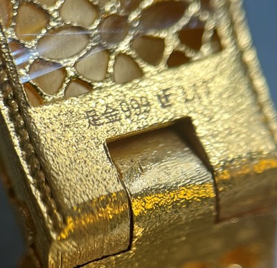 Lot 170 - A Chinese gold enamel and mother-of-pearl bangle, by Liufu