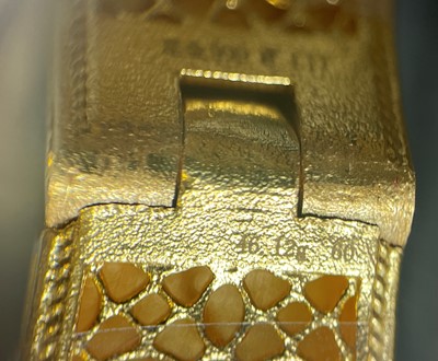 Lot 170 - A Chinese gold enamel and mother-of-pearl bangle, by Liufu