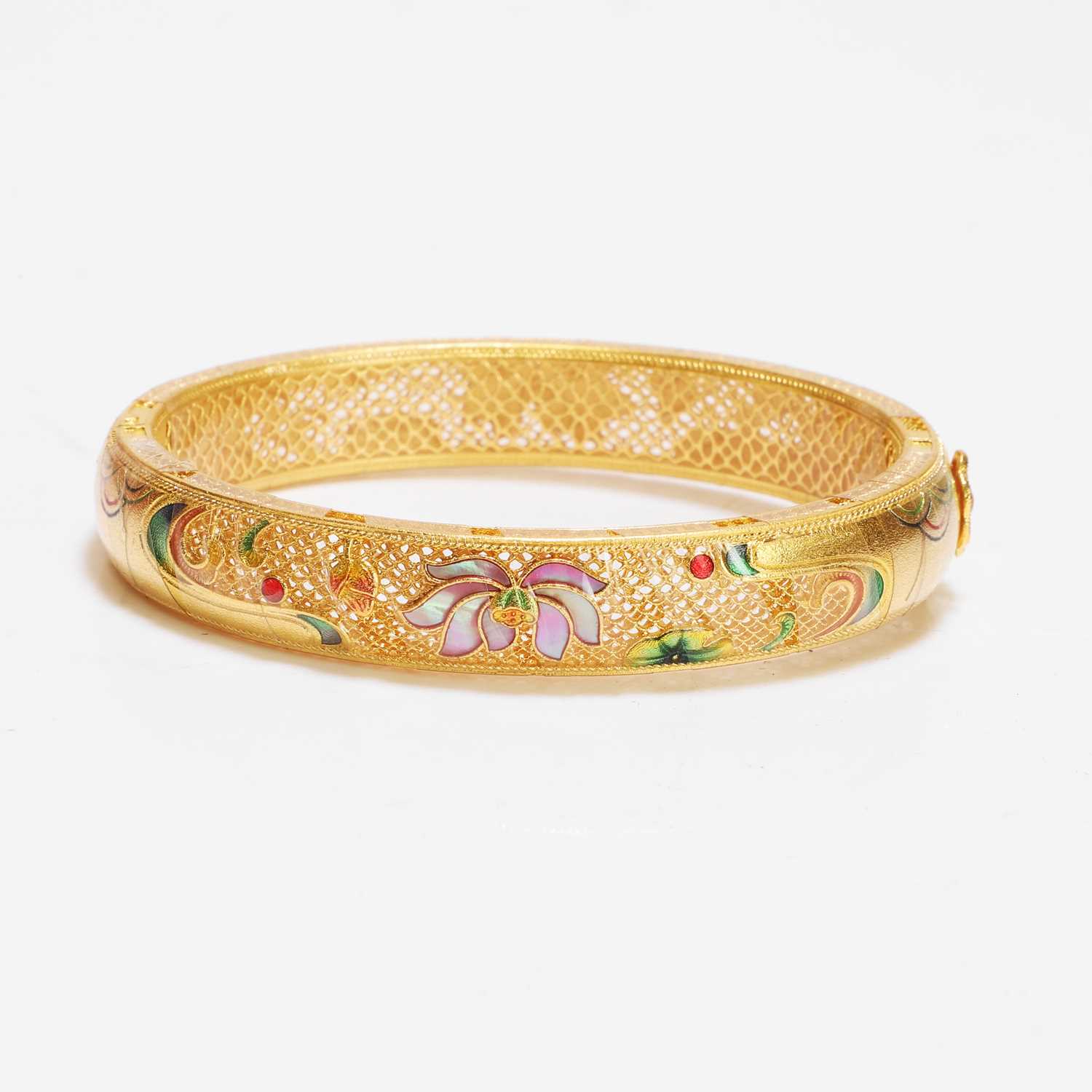 Lot 170 - A Chinese gold enamel and mother-of-pearl bangle, by Liufu