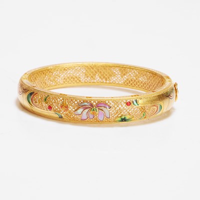 Lot 170 - A Chinese gold enamel and mother-of-pearl bangle, by Liufu