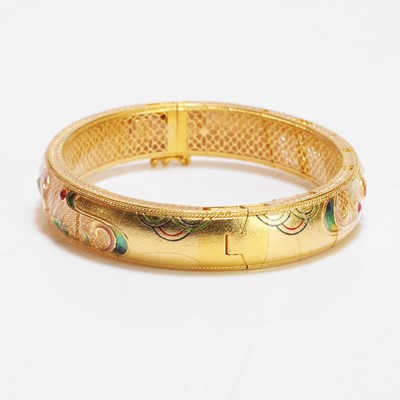 Lot 170 - A Chinese gold enamel and mother-of-pearl bangle, by Liufu