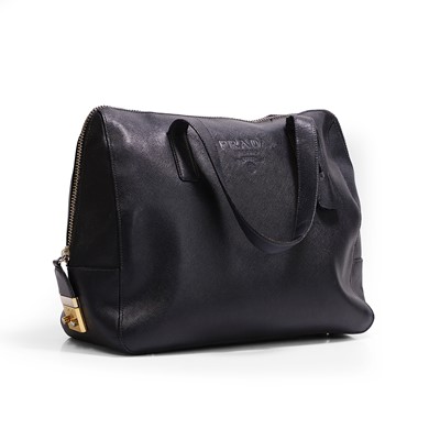 Lot 1447 - A Prada navy blue leather handbag