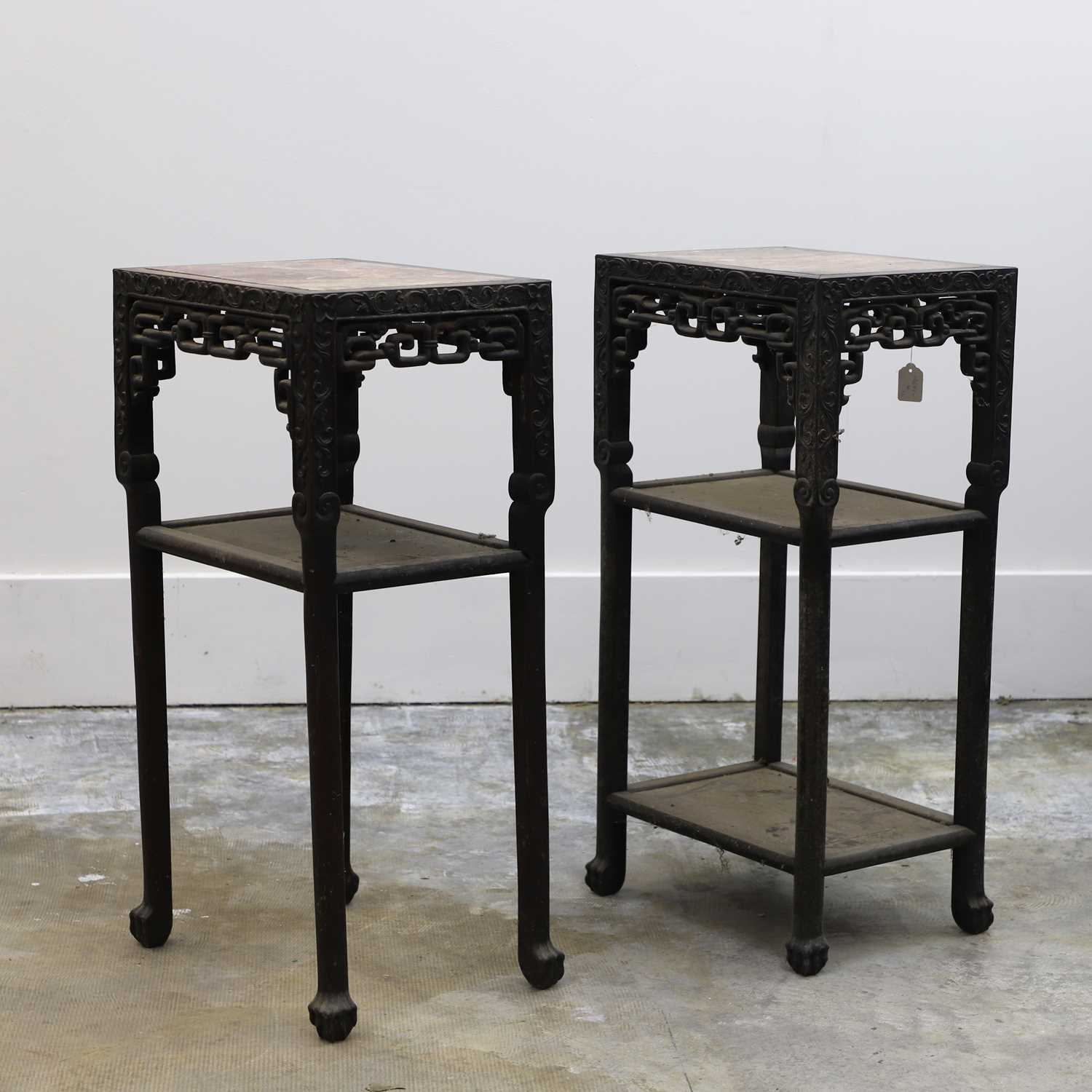Lot 157 - A pair of Chinese hardwood urn stands