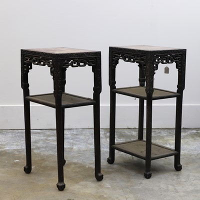 Lot 157 - A pair of Chinese hardwood urn stands