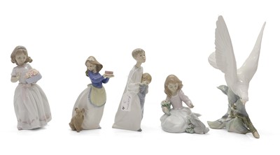 Lot 105 - Three Lladro figures of children, and a Nao figure
