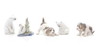 Lot 107 - Five Lladro figures of two puppies