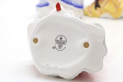 Lot 104 - Eight Royal Doulton figures