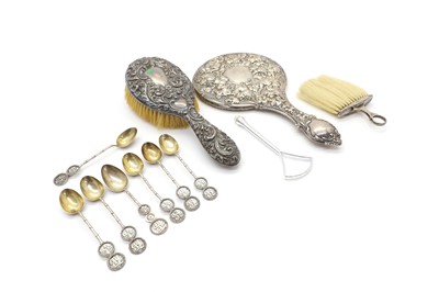 Lot 10 - A silver mounted dressing table brush