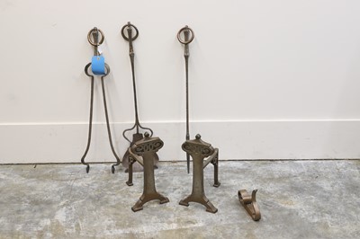 Lot 521 - A collection of Art and Crafts steel fire irons