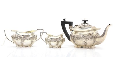 Lot 11 - A silver three piece tea service