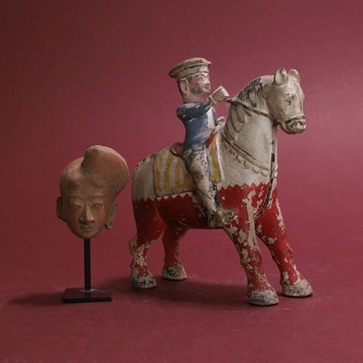 Lot 118 - An Indian carved wood figural group of a horse and rider