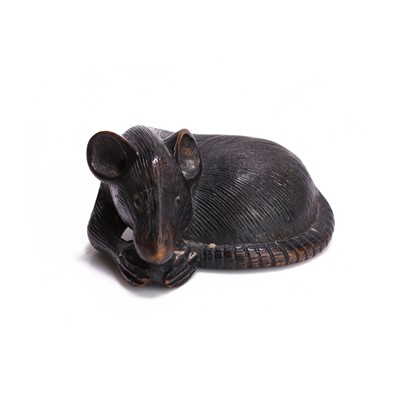 Lot 12 - A Japanese carved wooden netsuke