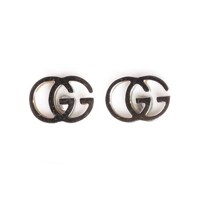 Lot 1112 - A pair of 18ct white gold stud earrings, by Gucci