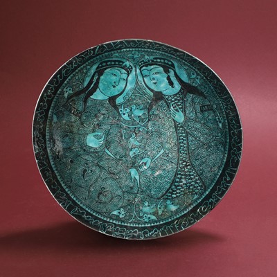 Lot 17 - A turquoise glazed and painted Persian pottery bowl