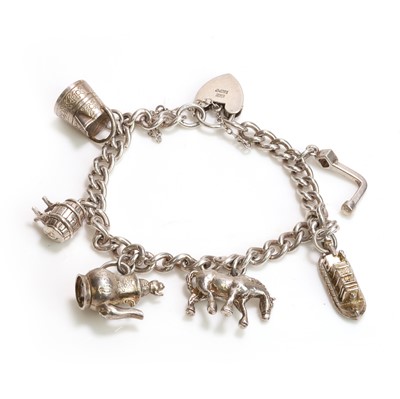 Lot 1257 - A silver charm bracelet