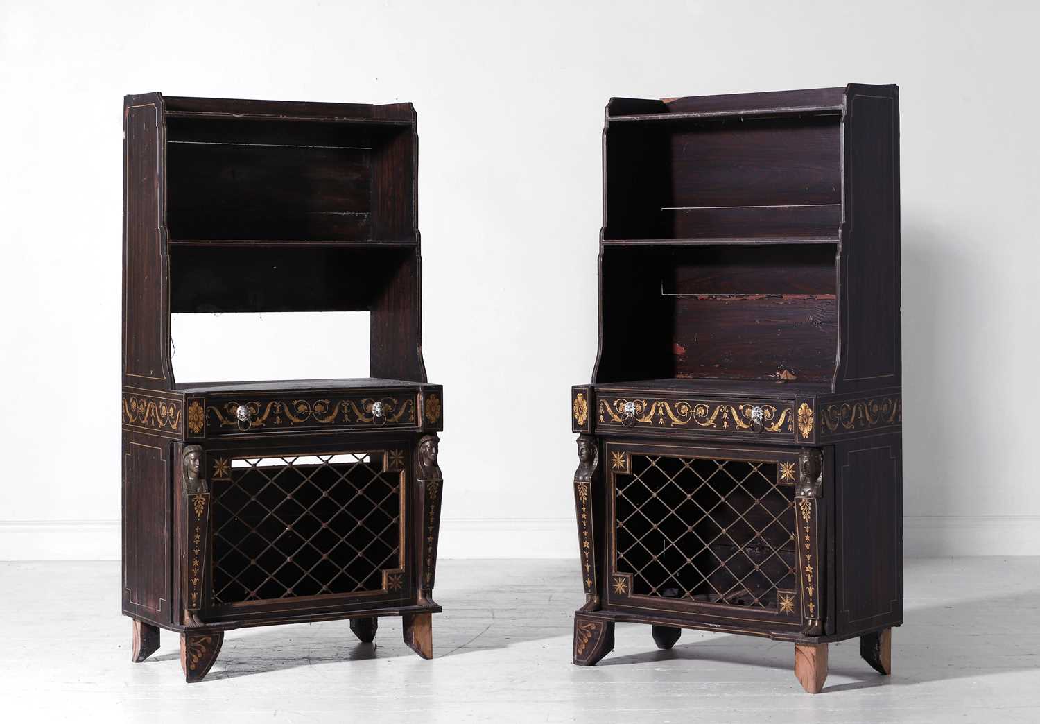 Lot 158 - A pair of Regency style painted wooden waterfall bookcases