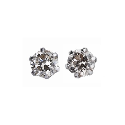 Lot 1063 - A pair of diamond single stone stud earrings