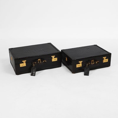 Lot 1477 - A near pair of Asprey alligator suitcases