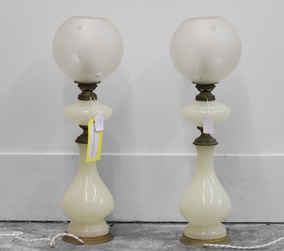 Lot 472 - A pair of opaline glass lamps