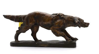 Lot 273 - A painted plaster wired haired pointer