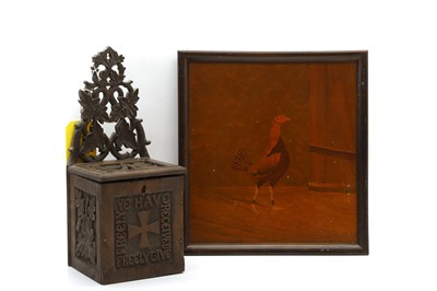 Lot 306 - A carved oak candle box
