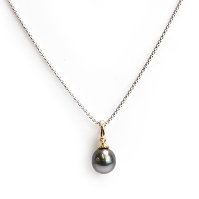 Lot 1135 - A cultured Tahitian pearl and diamond pendant