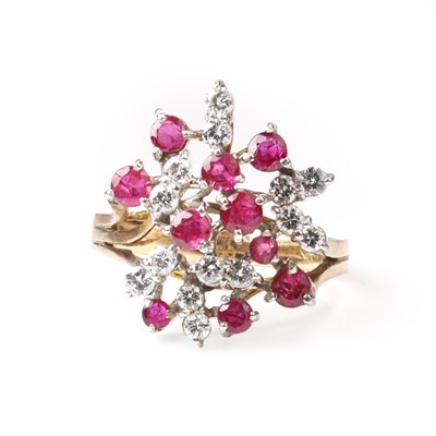Lot 1055 - A ruby and diamond spray cluster ring