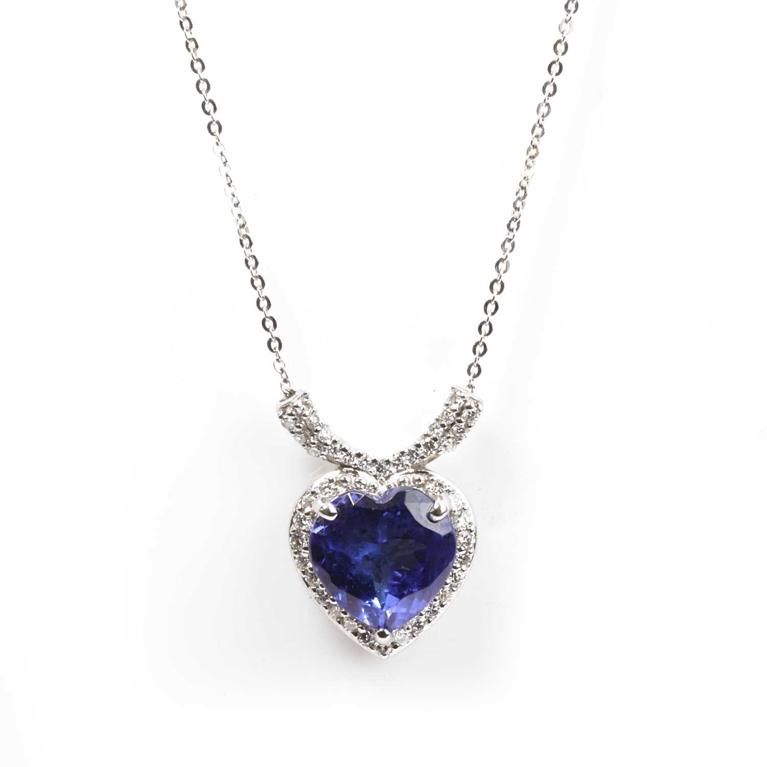Lot 1095 - A platinum, tanzanite and diamond pendant necklace