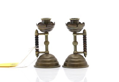 Lot 303 - A pair brass tapersticks
