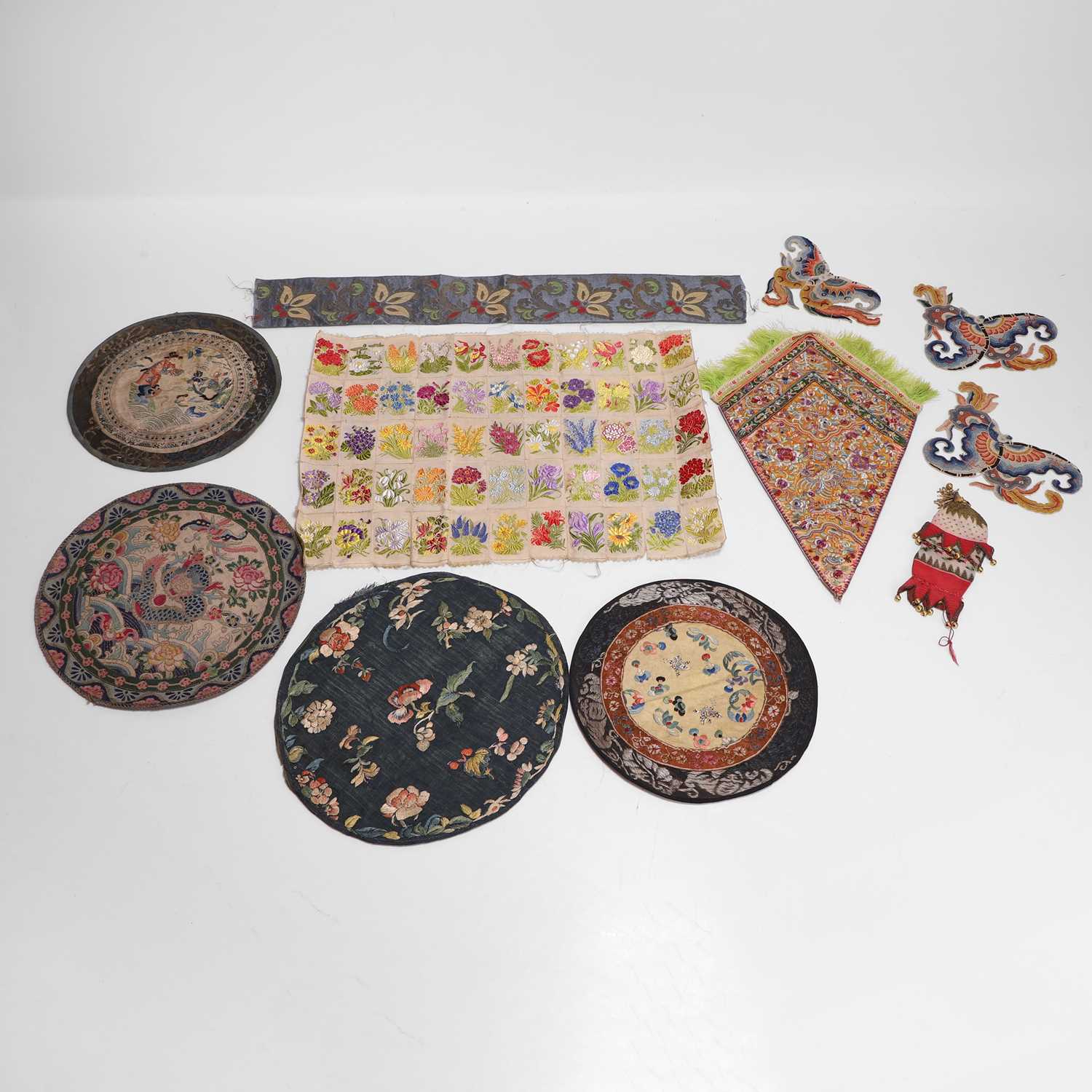 Lot 139 - A set of three Chinese silk embroidered butterfly appliqués