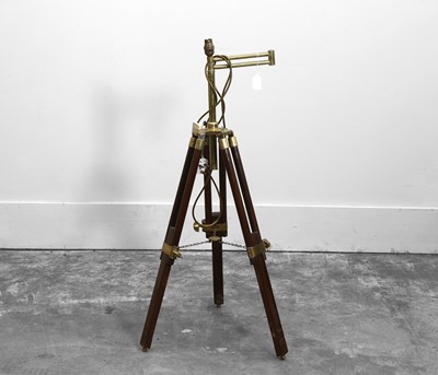 Lot 474 - A mahogany and brass tripod converted to a lamp