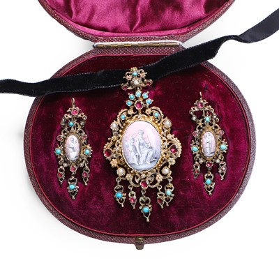 Lot 1025 - An antique silver gilt gemstone set miniature demi-parure