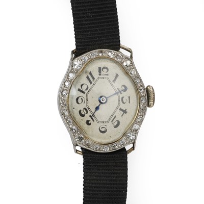 Lot 1303 - An early 20th century white gold diamond set mechanical cocktail watch