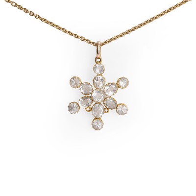 Lot 1019 - A rock crystal snowflake pendant on chain