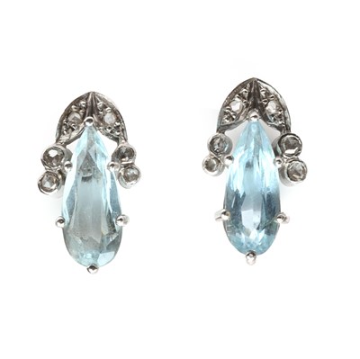 Lot 1083 - A pair of aquamarine and diamond earrings
