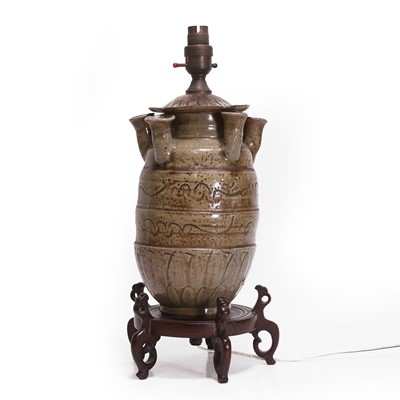 Lot 8 - A Chinese Longquan celadon lidded urn