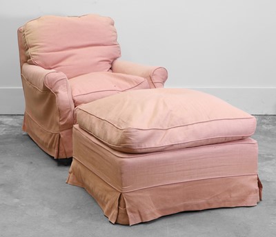 Lot 503 - A traditional armchair and matching footstool