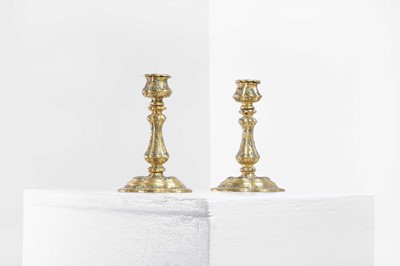 Lot 329 - A pair of gilt-bronze candlesticks