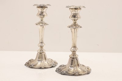Lot 14 - A pair of silver candlesticks