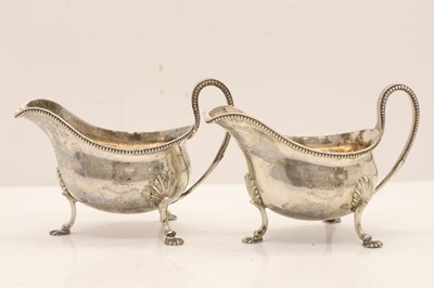 Lot 29 - A pair of George III silver sauceboats