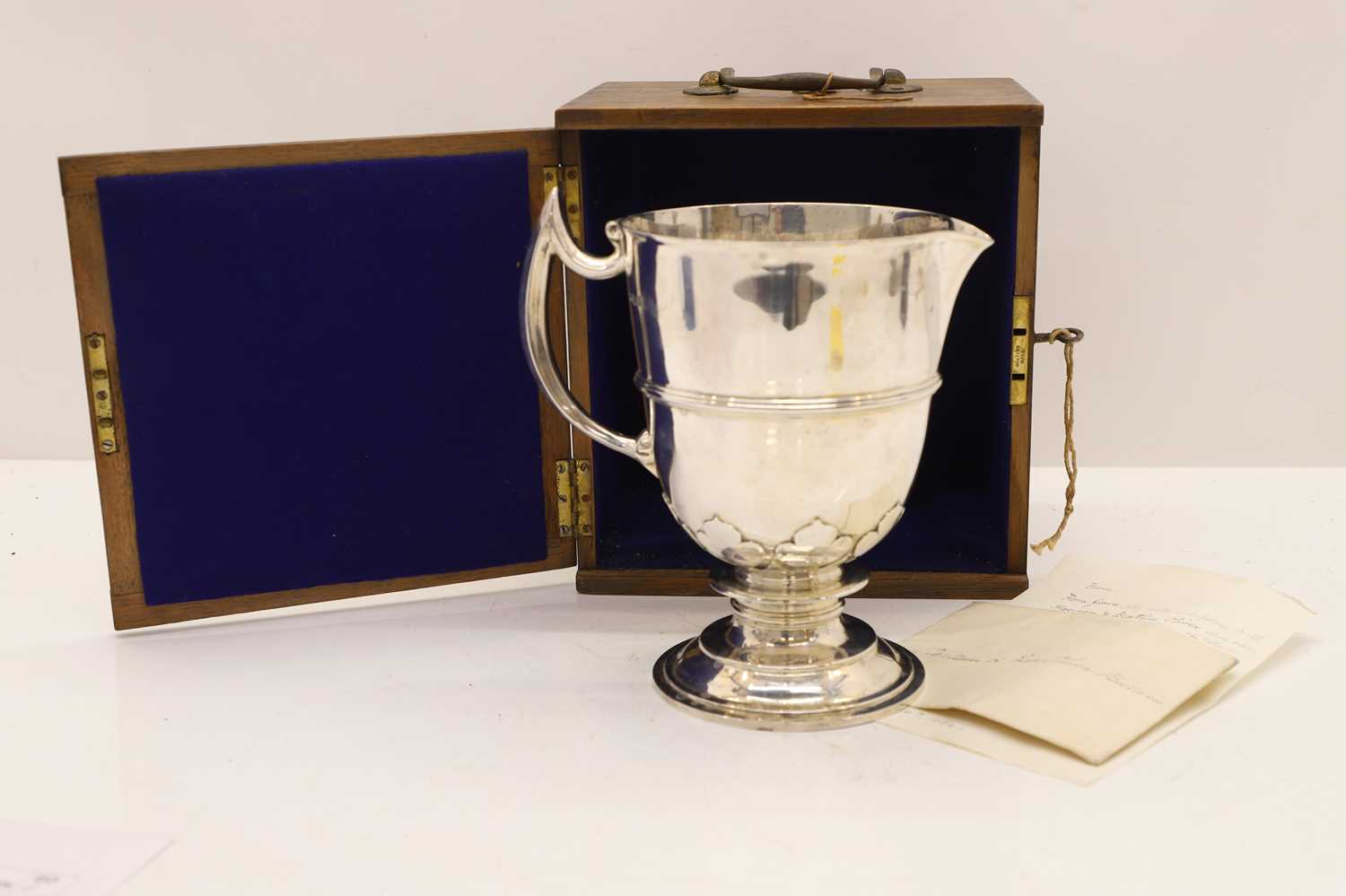 Lot 9 - A large silver flagon