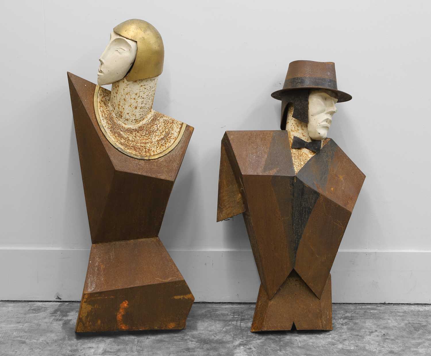 Lot 258 - A pair of modernist metal figural sculptures
