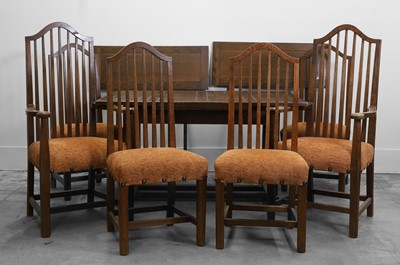 Lot 532 - A Gordon Russell oak draw leaf dining table